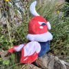 Peluche de coq gaulois vu du profil gauche